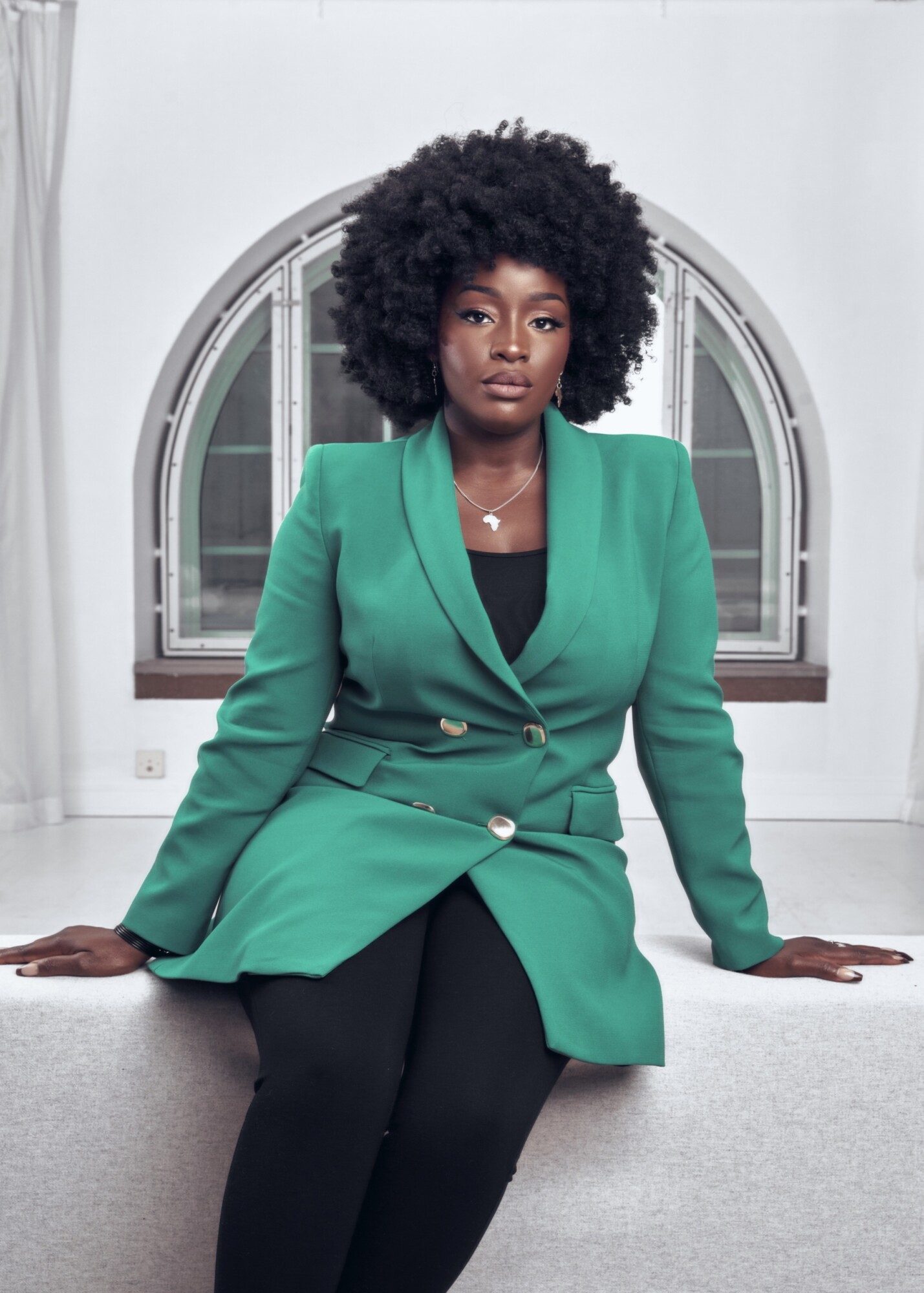 Lovette Jallow in her Natural hair n corporate setting